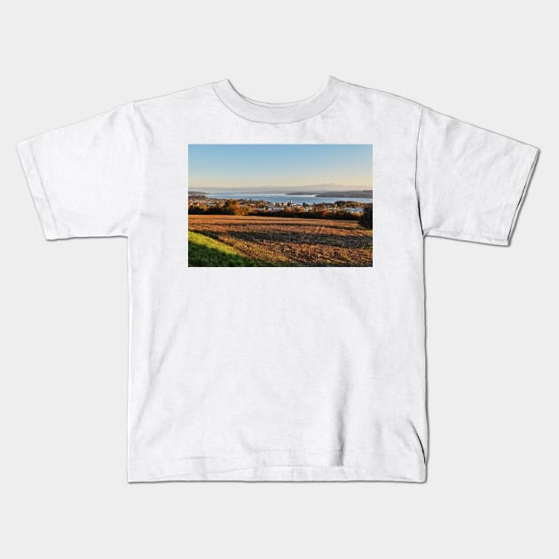 Autumn over Lake Constance at Aufkirch, Germany Kids T-Shirt by holgermader